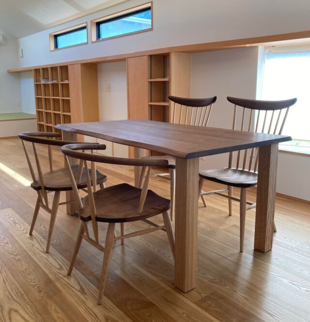 Wooden dining table with chairs